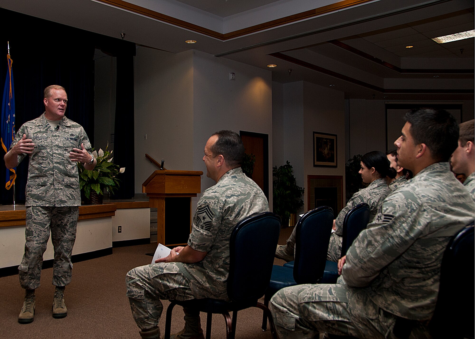 ALTUS AIR FORCE BASE, Okla. -- Chief Master Sgt. James Cody, command chief of Air Education and Training Command, speaks to Airmen from Altus AFB during an Airman's Call at the Freedom Community Center, Sept. 10, 2012. During the Airman's Call Cody discussed a number of topics, to include getting to know fellow Airmen, reporting sexual assaults, and creating a cost conscious culture in today's Air Force. (U.S. Air Force photo by Senior Airman Kenneth W. Norman / Released / 97th Air Mobility Wing Public Affairs)