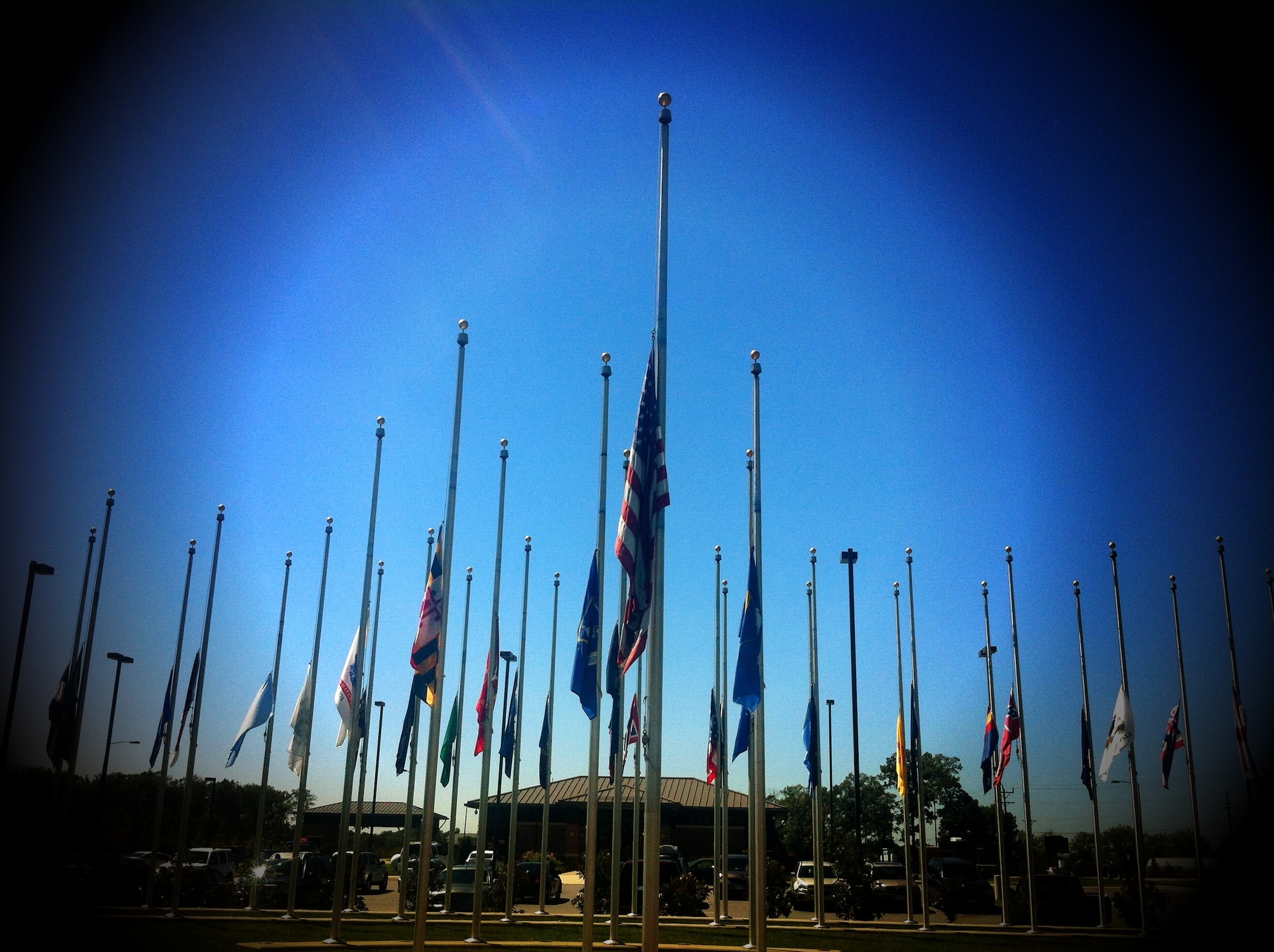 Flags at Joint Base Andrews, Md., fly at half-staff in remembrance of those who lost their lives in the 9/11 terrorist attacks on the United States. Sept. 11 is also known as Patriot Day, which is an annual observance on September 11 to remember those who were injured or died during the terrorist attacks in the United States on September 11, 2001. (U.S. Air Force photo/ Senior Airman Katie Spencer)