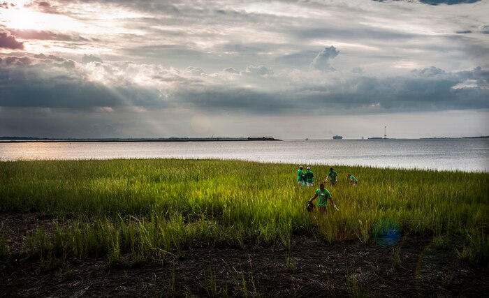 Airmen from Joint Base Charleston – Air Base scour Waterfront Park for trash Sept. 8, 2012, in downtown Charleston, S.C. The Waterfront Park is commonly littered with trash and debris carried in from the ocean. The Waterfront Park cleanup was coordinated with the help of “Keep Charleston Beautiful,” a non-profit organization dedicated to promoting the cleanliness and beautification of the City of Charleston through education, public awareness and community involvement. The Day of Caring, organized locally by the Trident United Way, saw more than 8,500 volunteers working on more than 300 projects around the Lowcountry.
(U.S. Air Force photo / Airman 1st Class Tom Brading) 
