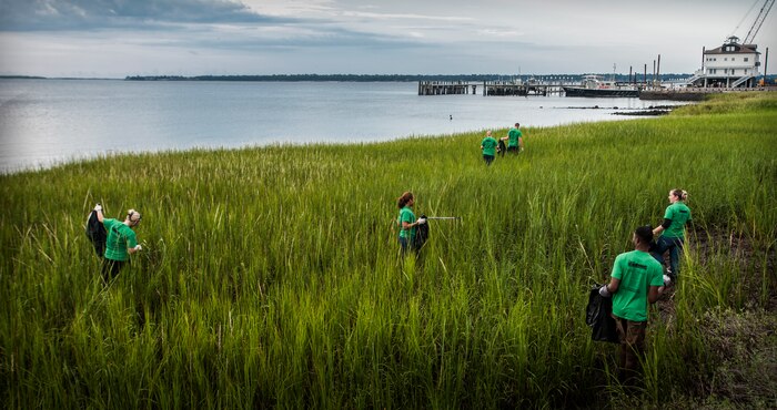 Airmen from Joint Base Charleston – Air Base scour Waterfront Park for trash Sept. 8, 2012, in downtown Charleston, S.C. The Waterfront Park is commonly littered with trash and debris carried in from the ocean. The Waterfront Park cleanup was coordinated with the help of “Keep Charleston Beautiful,” a non-profit organization dedicated to promoting the cleanliness and beautification of the City of Charleston through education, public awareness and community involvement. The Day of Caring, organized locally by the Trident United Way, saw more than 8,500 volunteers working on more than 300 projects around the Lowcountry.
 (U.S. Air Force photo / Airman 1st Class Tom Brading)
