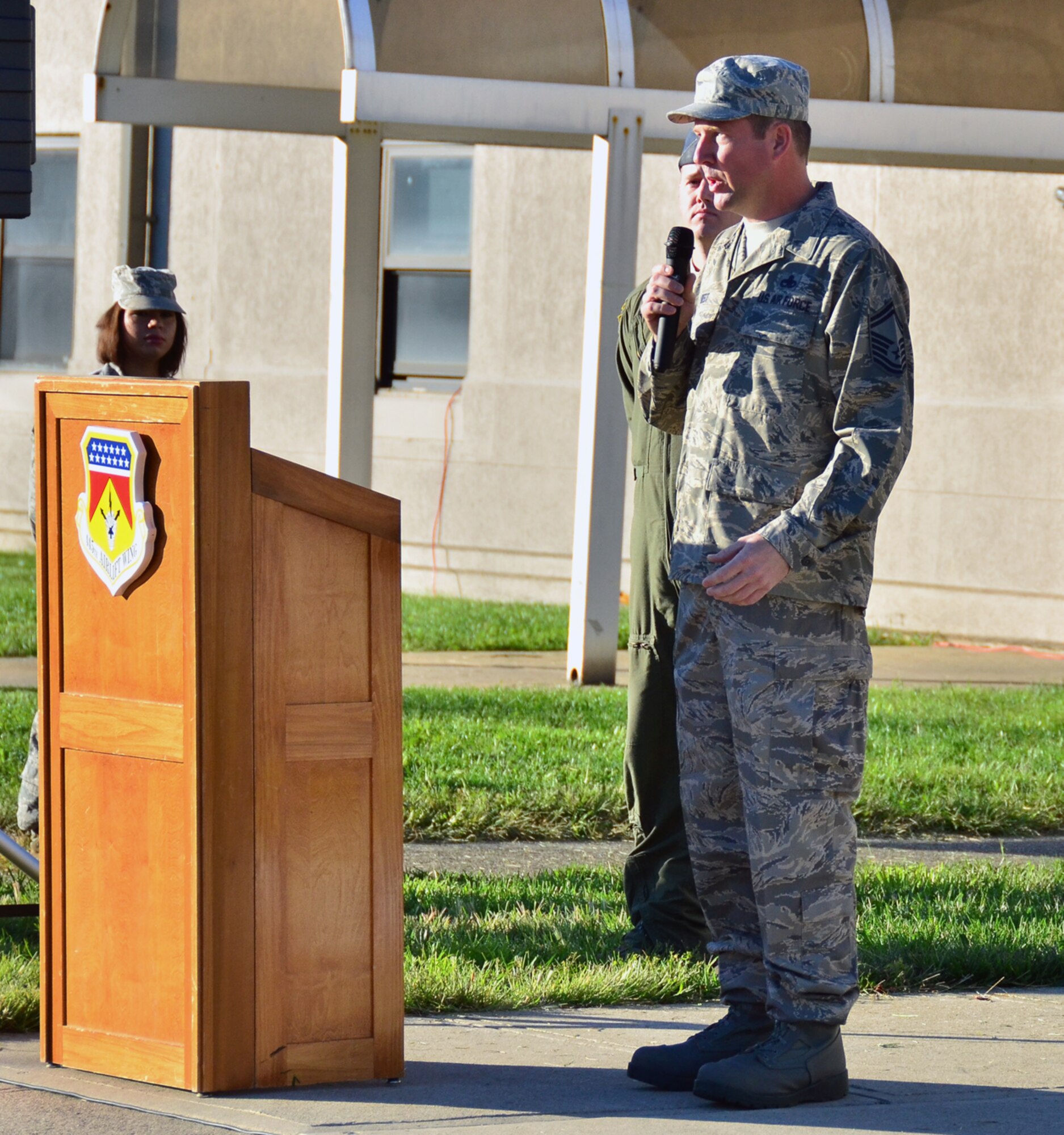 WRIGHT-PATTERSON AIR FORCE BASE, Ohio – Senior Master Sgt. Mike West, 445th Aircraft Maintenance Squadron section chief, reflects back on his memories of hearing about the attacks on the World Trade Center and Pentagon during the 445th Airlift Wing’s Patriot Day ceremony held in front of the 445th AW Headquarters building Sept. 11. (U.S. Air Force photo/Stacy Vaughn)
