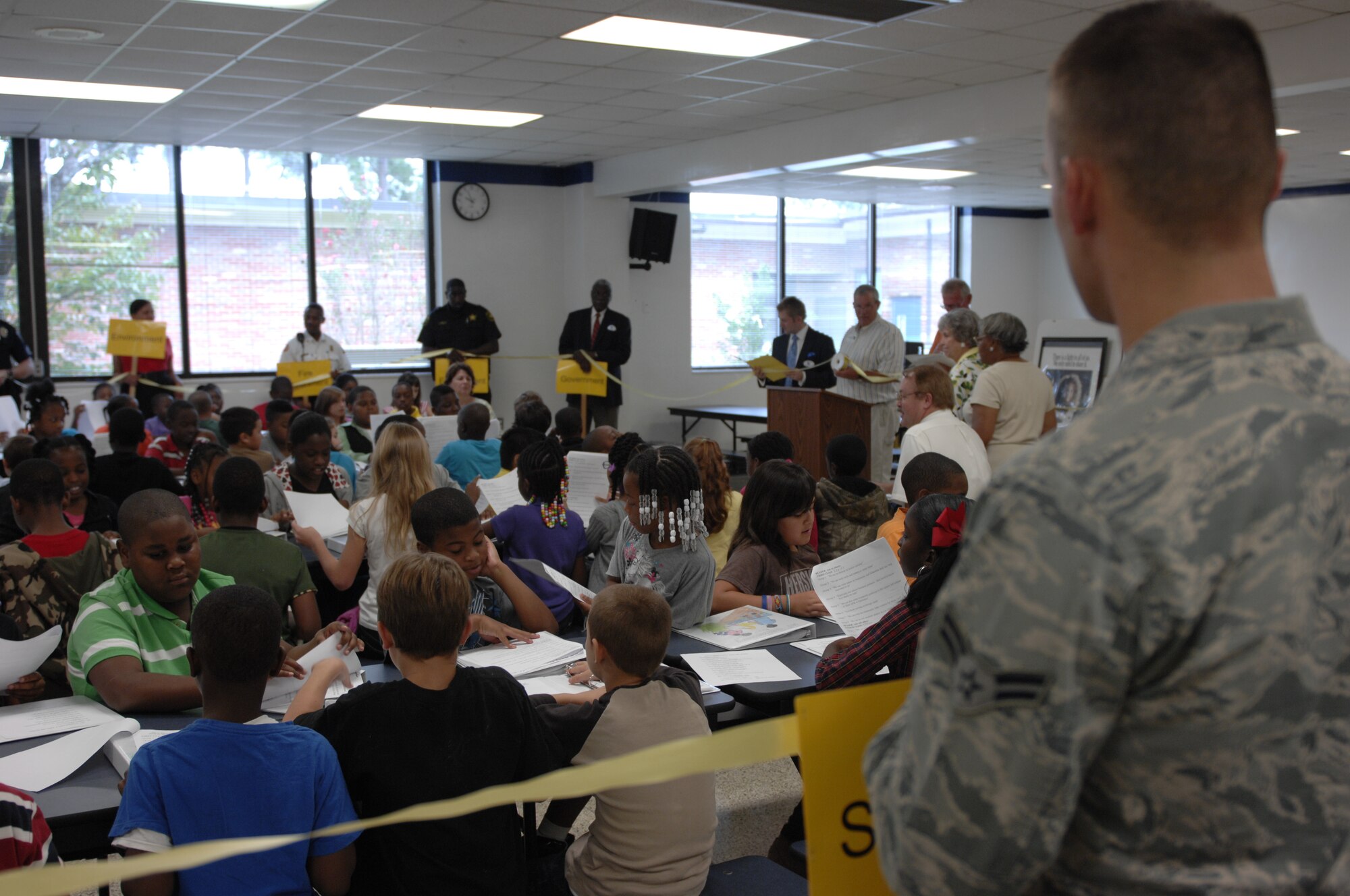 Airman 1st Class Josh Calhoun, 20th Force Support Squadron honor guard member, visits Wilson Drive Elementary School, Sumter, S.C., to speak to fourth graders about his job and his role in the community Sept. 6, 2012. Other members of the community joined him including representatives from law enforcement, the fire department, volunteer groups, the local government, education system, hospitals and Shaw Air Force Base as part of a program called My Community and Me. Calhoun is also a native of Newland, N.C. (U.S. Air Force photo by Airman 1st Class Krystal M. Jeffers/Released)