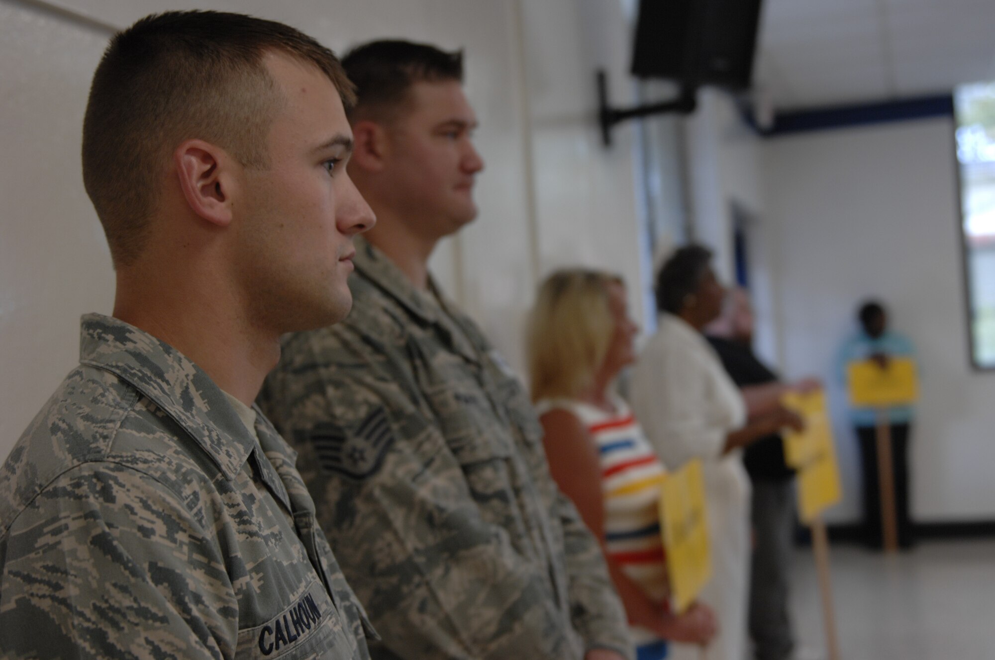 Airman 1st Class Josh Calhoun and Staff Sgt. David Yarber, 20th Force Support Squadron honor guard members, visit Wilson Drive Elementary School, Sumter, S.C., to speak to fourth graders about their jobs and their role in the community Sept. 6, 2012. Other members of the local community that attended include representatives from law enforcement, the fire department, volunteer groups, the local government, the education system, hospitals and Shaw Air Force Base. They all gathered at the school as part of a program, called My Community and Me, to expand the students’ knowledge of the community, the local government’s structure, and the community’s history. Calhoun is a native of Newland, N.C., while Yarber is a native of Jacksonville, Fla. (U.S. Air Force photo by Airman 1st Class Krystal M. Jeffers/Released)