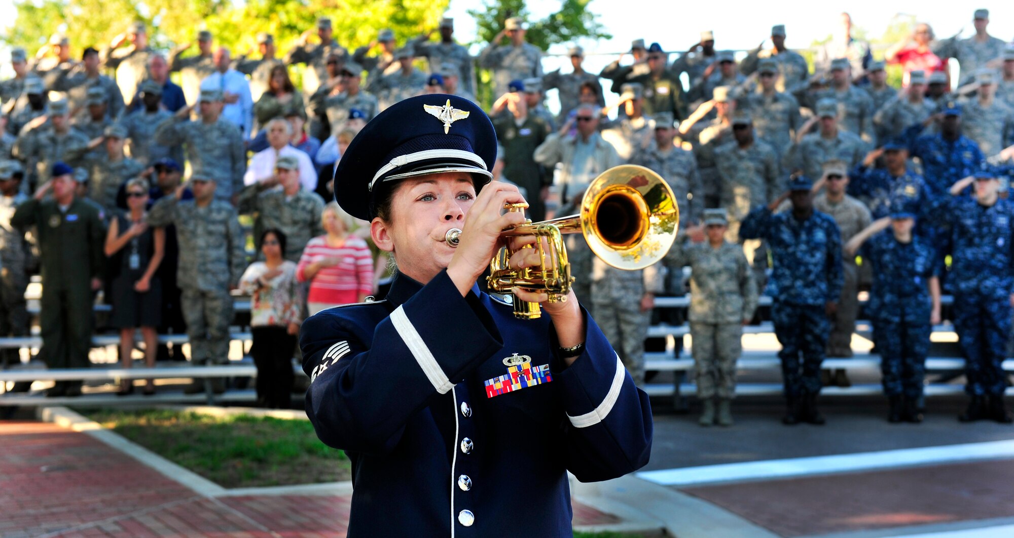 Staff Sgt. Brenna Dooley, USAF Band of Mid-America plays Taps on the trumpet during the 2012 9/11 rememberance ceremony. (U.S. Air Force photo/ Staff Sgt. Stephenie Wade) 
