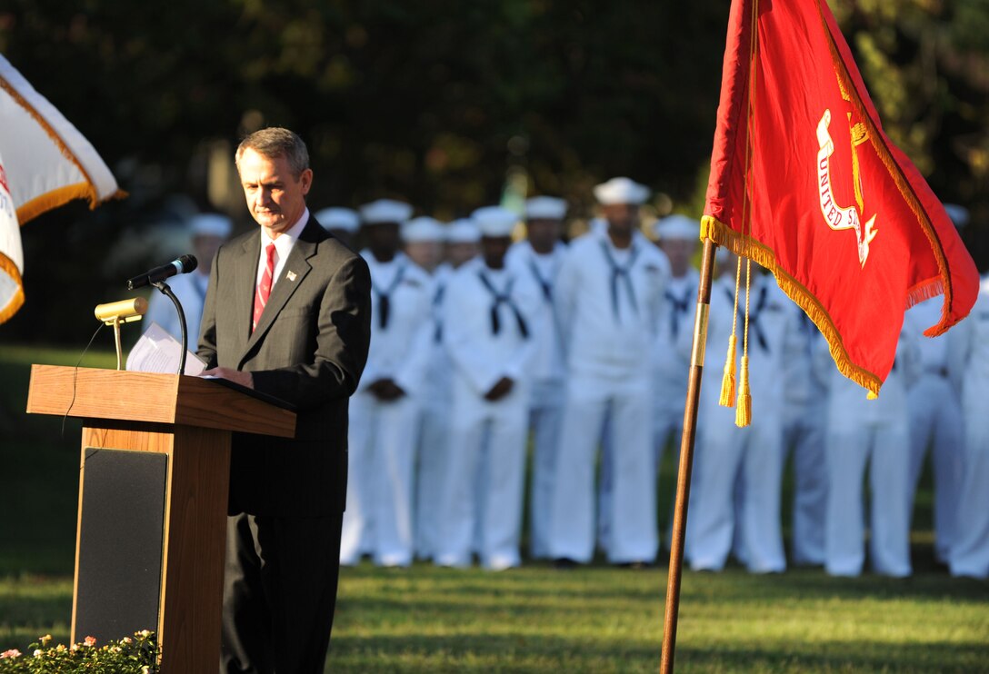 Retired U.S. Army Lt. Col. John Gately, chairman of the Hampton Millitary Affairs Committee, speaks before a crowd gathered at Gosnold's Hope Park in Hampton, Va., Sept. 11, 2012. The crowd consisted of Service members, local police and citizens of Hampton who joined together to pay their respects to the victims of the Sept. 11 terrorist attacks. (U.S. Air Force photo by Senior Airman Jarad A. Denton/Released)