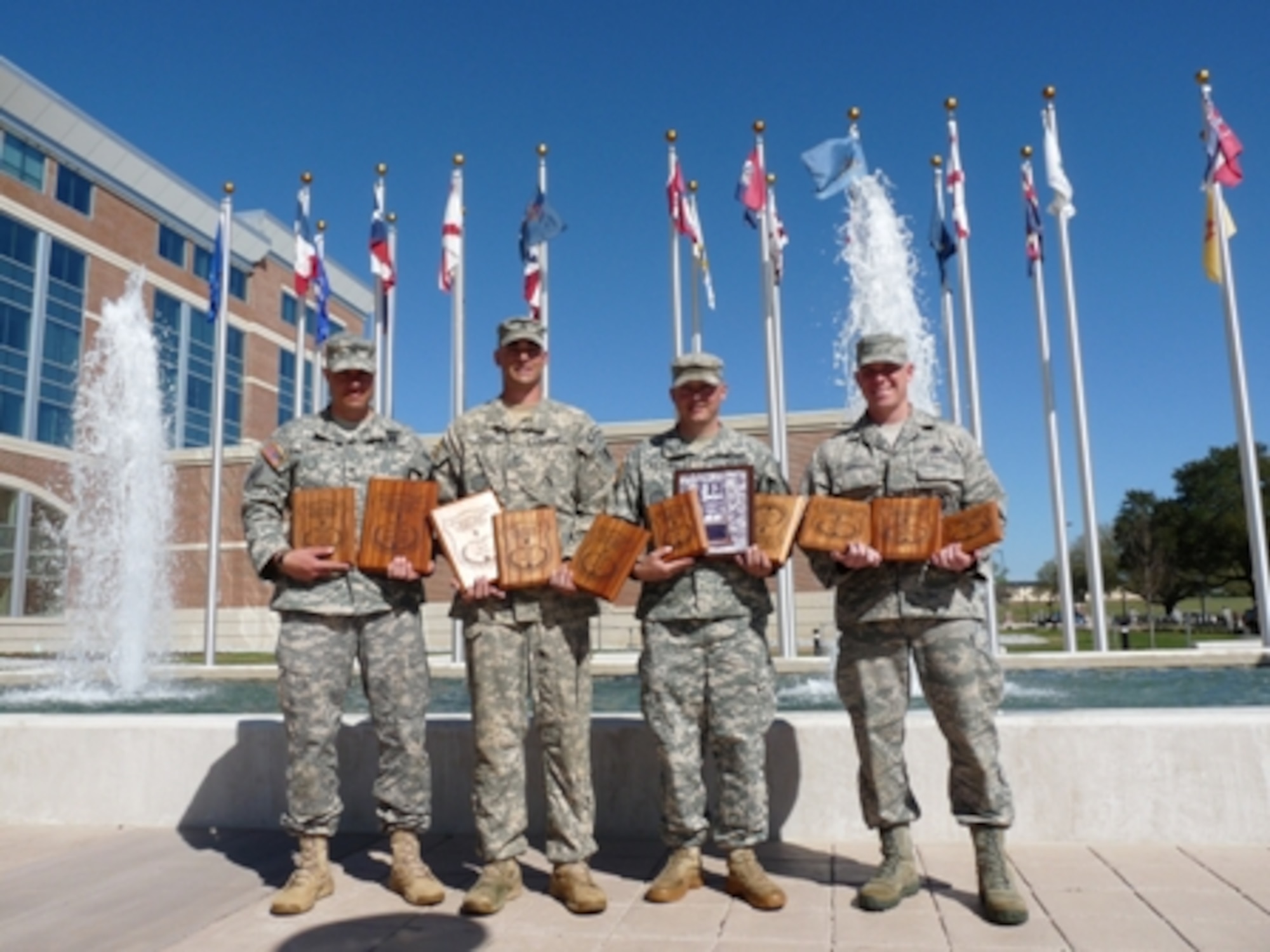 The Missouri National Guard's team "Regular Forces" took second place in overall team competition and scored high individually at the All Army Small Arms Championships at Fort Benning, Ga., in early March. Missouri Guard team members are (from left) Staff Sgt. Jody Salcido, Sgt. 1st Class James Phelps, Sgt. James Whitener and Master Sgt. Benjamin Israel. (Ann Keyes/Missouri National Guard)