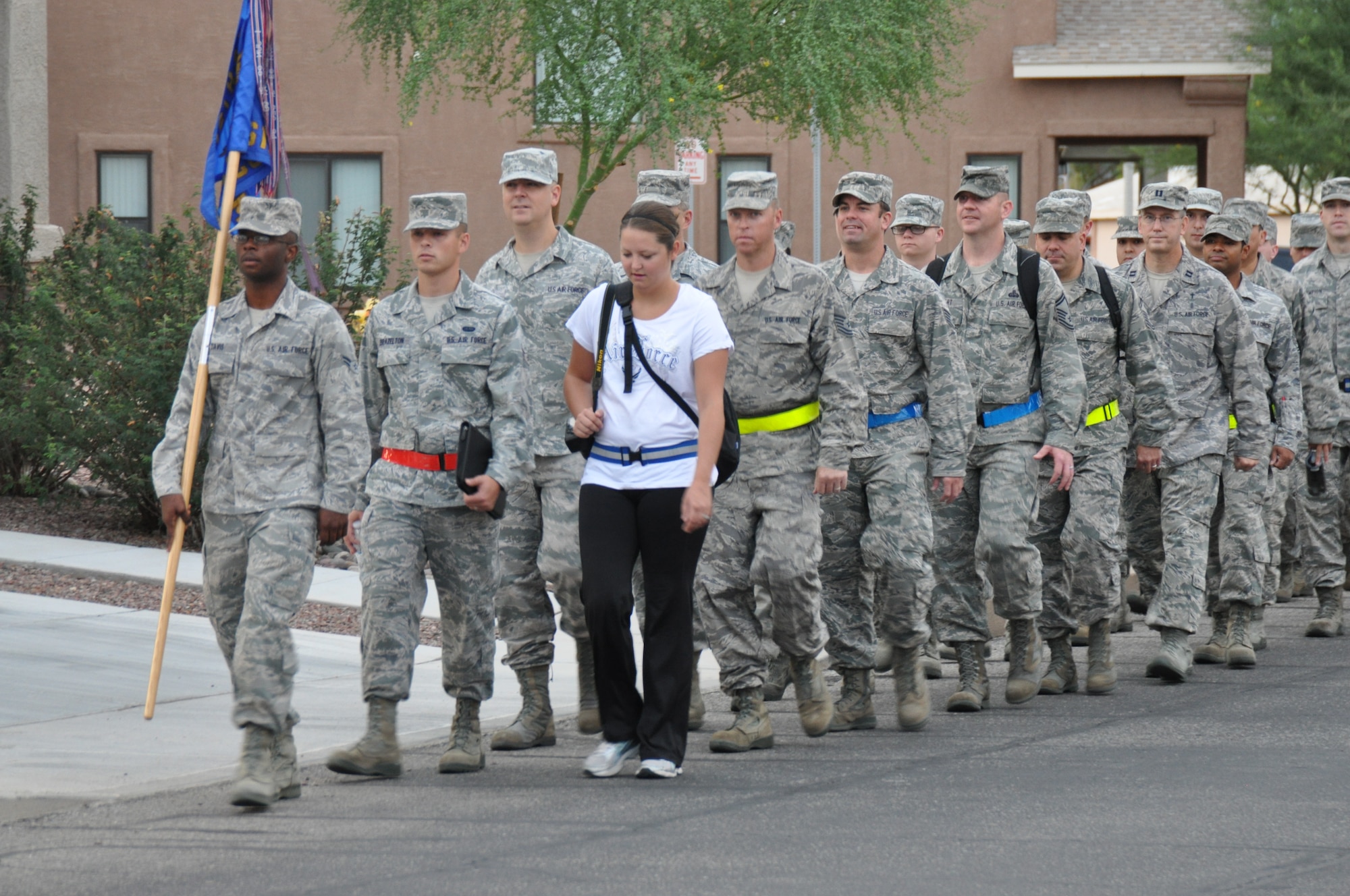 Members of the 612th Air Communications squadron embark on a Memorial March to honor 9/11 victims, Sept. 11. (U.S. Air Force photo by Master Sgt. Kelly Ogden). 