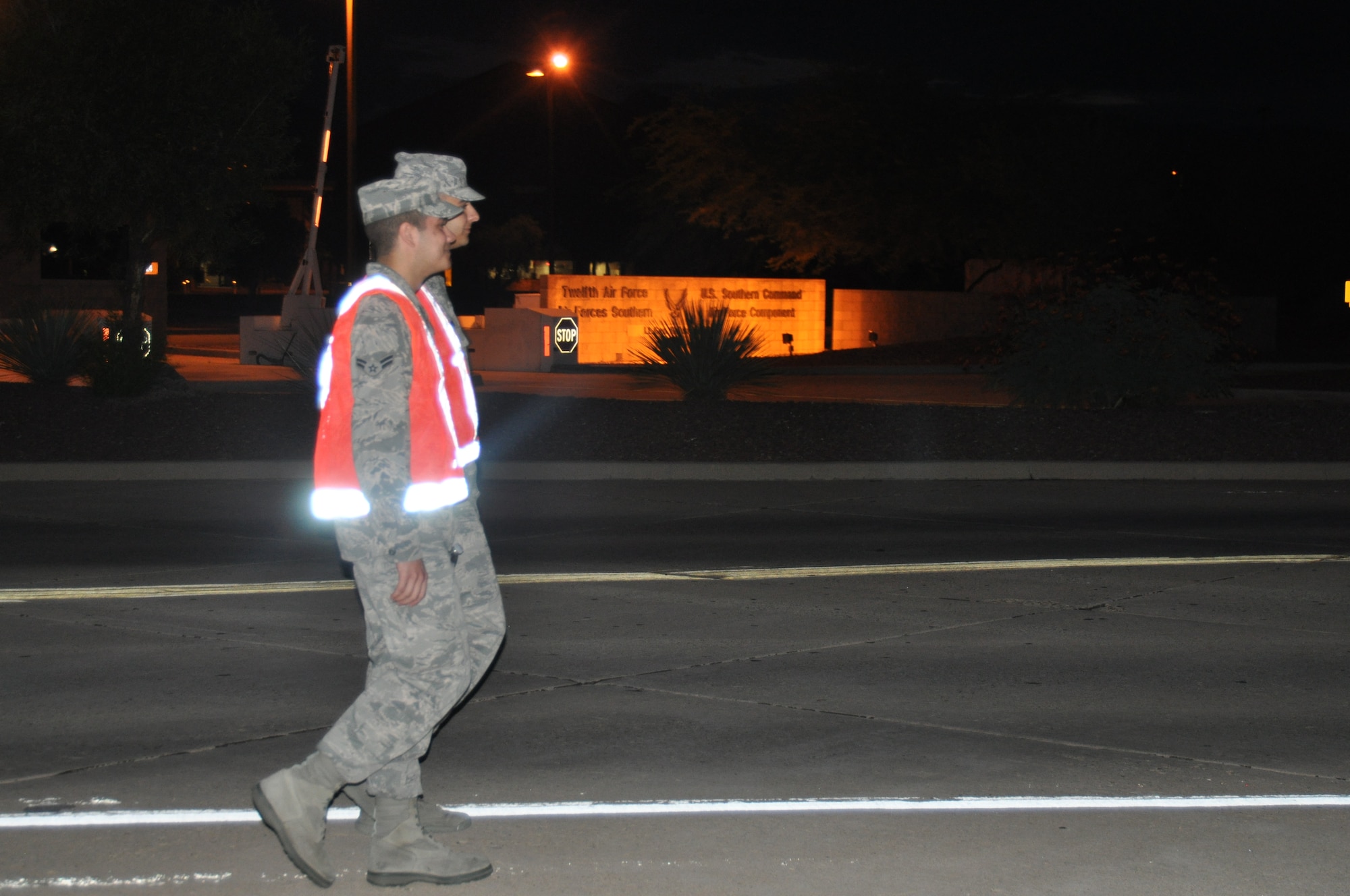 Members of the 612th Air Communications squadron embark on a Memorial March to honor 9/11 victims, Sept. 11. (U.S. Air Force photo by Master Sgt. Kelly Ogden). 