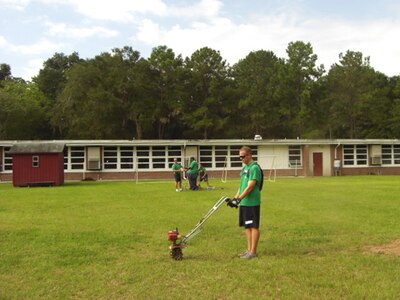 Machinist’s Mate Chief Petty Officer Select Jeremy Price, Naval Consolidated Brig Charleston, prepares base paths on a kickball field Sept. 7, at Jane Edwards Elementary School, Edisto Island, S.C. The Day of Caring, organized locally by the Trident United Way, saw more than 8,500 volunteers working on more than 300 projects around the Lowcountry. (U.S. Navy photo Chief Petty Officer Michael Vira)

 
