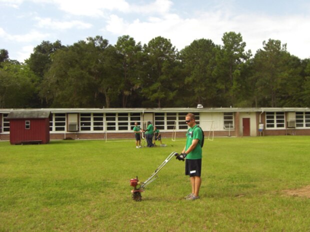Machinist’s Mate Chief Petty Officer Select Jeremy Price, Naval Consolidated Brig Charleston, prepares base paths on a kickball field Sept. 7, at Jane Edwards Elementary School, Edisto Island, S.C. The Day of Caring, organized locally by the Trident United Way, saw more than 8,500 volunteers working on more than 300 projects around the Lowcountry. (U.S. Navy photo Chief Petty Officer Michael Vira)

 
