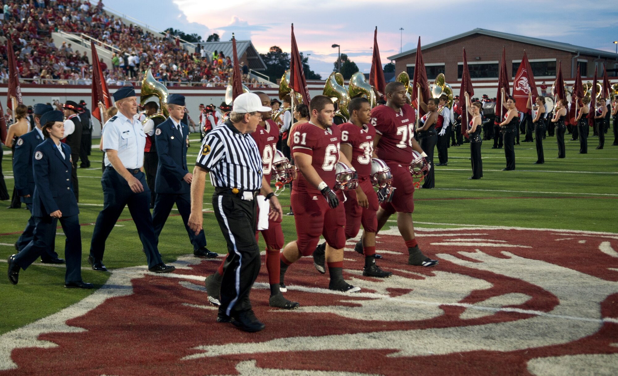 U.S. Air Force Col. Steven Ramer, 23d Wing vice commander, attends the Lowndes County High School Military Appreciation Night football game at Martin Stadium in Valdosta Ga., Sept. 7, 2012. Ramer was an honorary captain and called the coin toss at the beginning of the game to decide which team gets the ball first. (U.S. Air Force photo by Airman 1st Class Paul Francis/Released)
