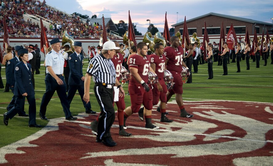 U.S. Air Force Col. Steven Ramer, 23d Wing vice commander, attends the Lowndes County High School Military Appreciation Night football game at Martin Stadium in Valdosta Ga., Sept. 7, 2012. Ramer was an honorary captain and called the coin toss at the beginning of the game to decide which team gets the ball first. (U.S. Air Force photo by Airman 1st Class Paul Francis/Released)
