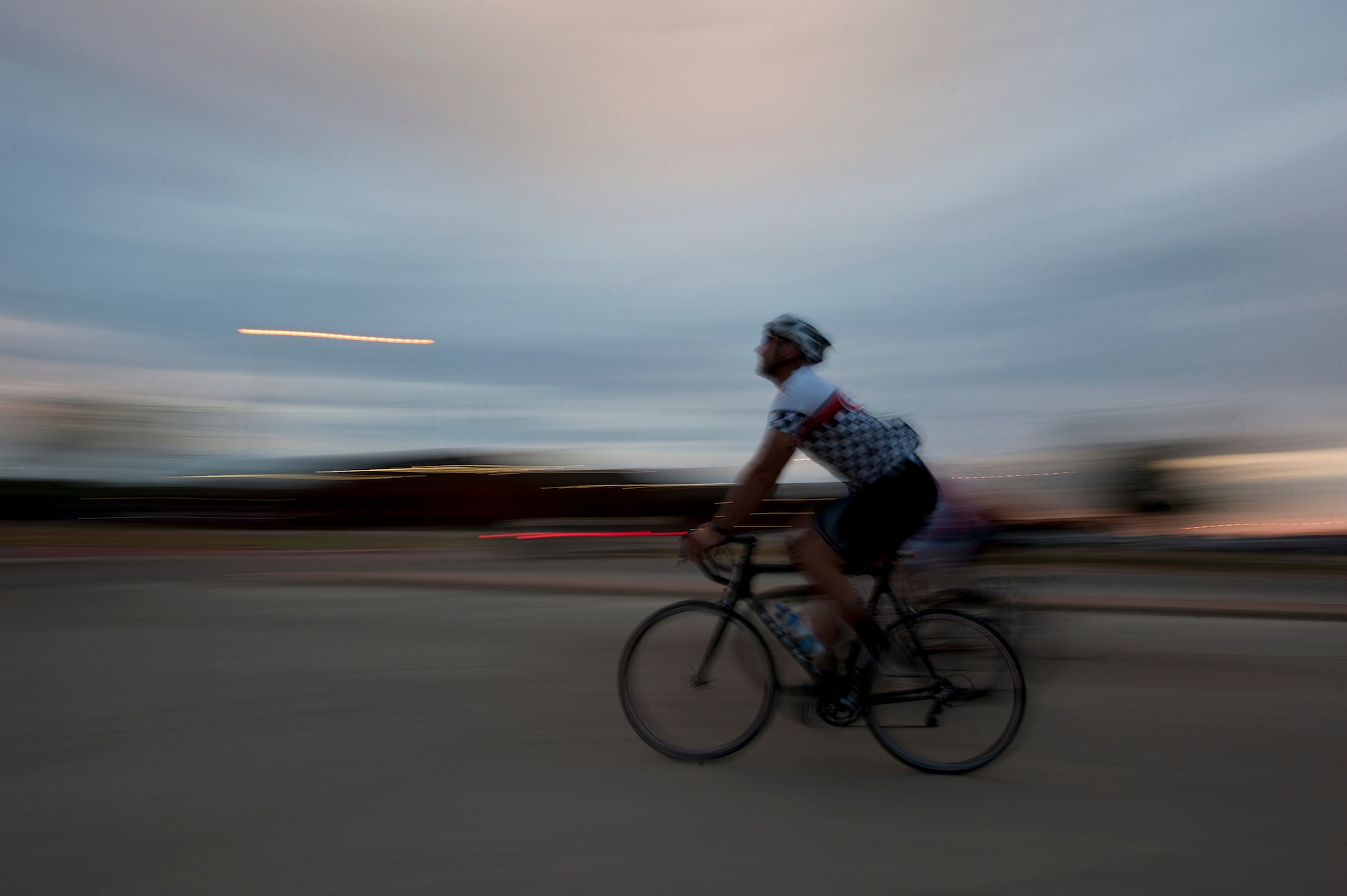 A cyclist warms up Sept. 8, 2012, before the second annual Le Tour De Dyess at Dyess Air Force Base, Texas. The race began at the fitness center and weaved 26-miles throughout Dyess.  (U.S. Air Force photo by Airman 1st Class Damon Kasberg/Released)