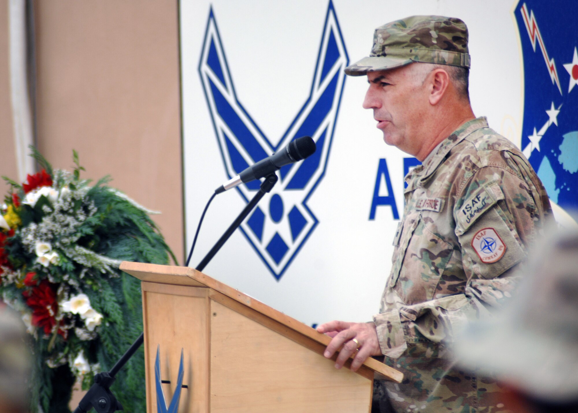 U.S. Air Force Brig. Gen. Scott Dennis, 451st Air Expeditionary Wing and Kandahar Airfield (NATO) commander, gives his remarks during a memorial ceremony here today remembering those who lost their lives on Sept. 11, 2001. (U.S. Air Force photo/Master Sgt. Russell Martin/RELEASED)