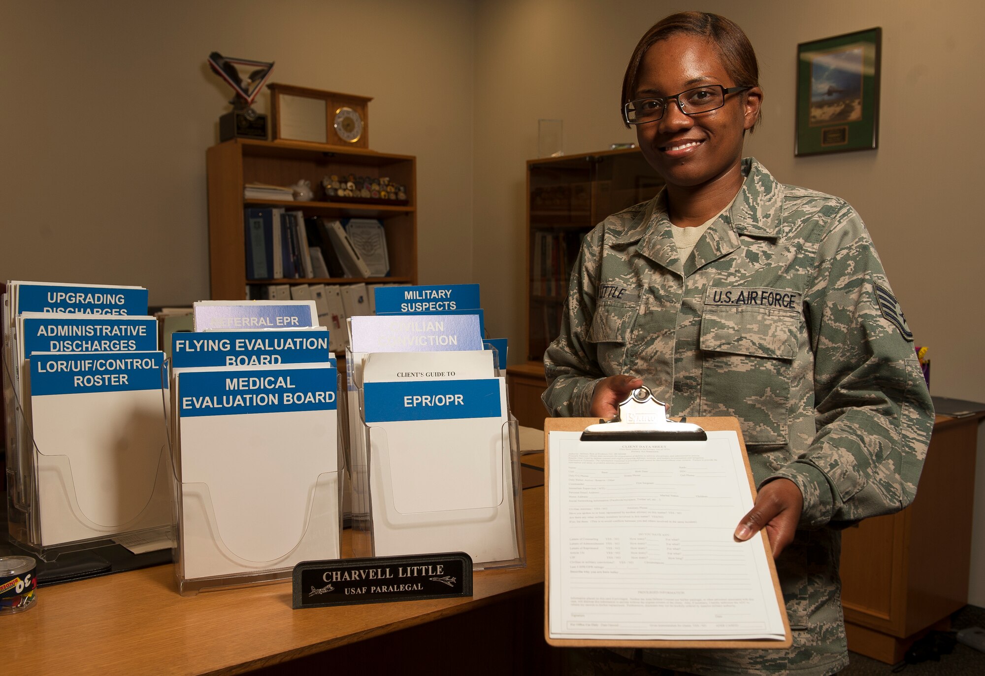Staff Sgt. Charvell Little, a paralegal with the Area Defense Counsel, provides legal assistance to the ADC attorney defending Airmen facing courts-martial and discharge boards. Little also provides one-on-one assistance to Airmen responding to adverse administrative actions.  (U.S. Air Force photo by Staff Sgt. Russ Scalf)