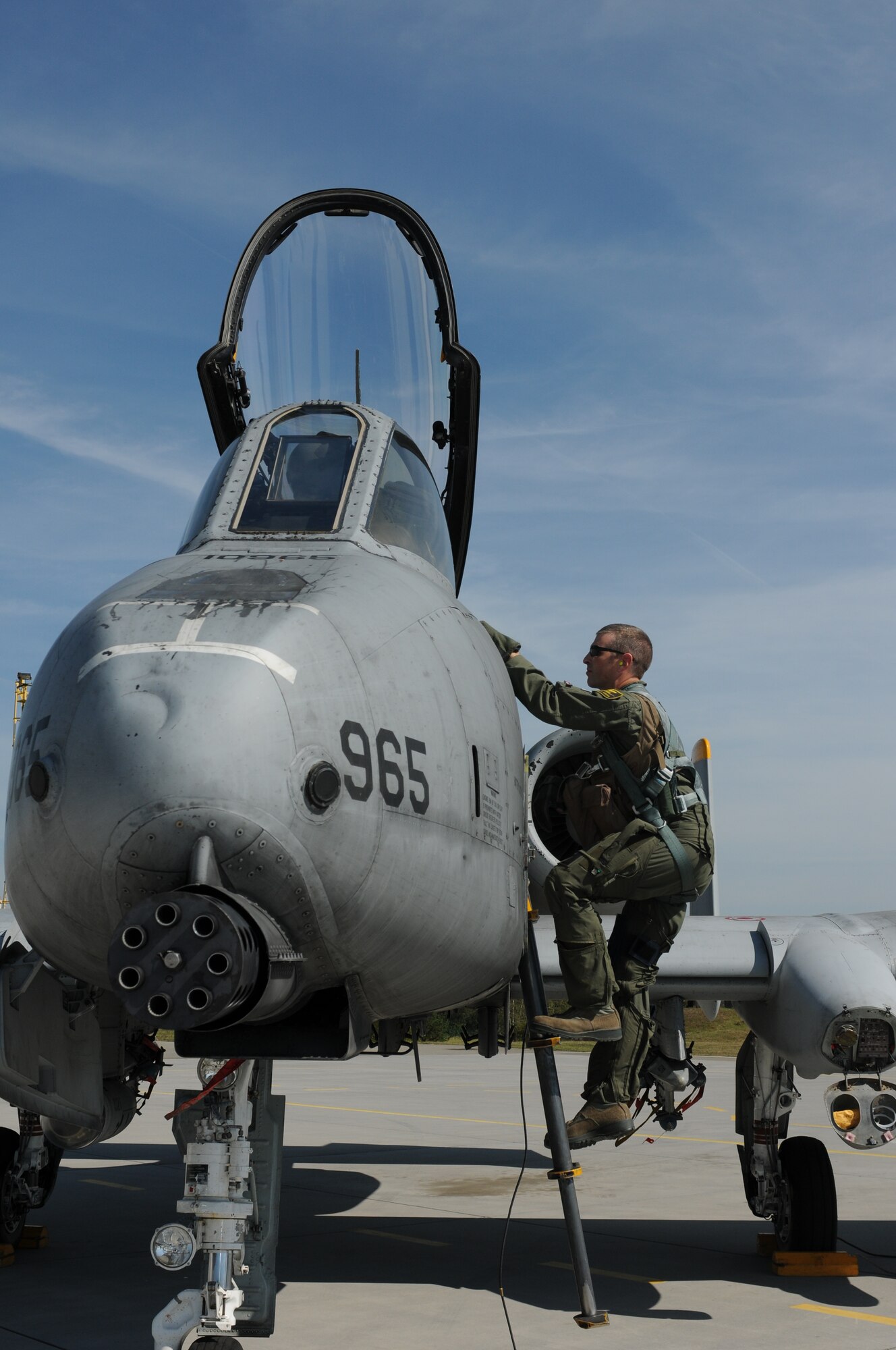 NAMEST AIR BASE, Czech Republic -- Maj. Andy Korsmo, 81st Fighter Squadron A-10 Thunderbolt II pilot, climbs up to the cockpit of an A-10 to take off for a close air support mission Sept. 10, during Ramstein Rover 2012 here. RARO 12 is a NATO-partnership building exercise involving more than 16 nations. A-10 Thunderbolt IIs from the 81st FS are participating in the exercise to provide close air support to partnering nations and practice forward air control missions with their NATO allies in international security assistance force realistic scenarios. Participating in exercises like RARO 12 ensures effective employment of airpower in support of alliance or coalition forces while mitigating risks to civilians in contingency operations. (U.S. Air Force photo by Senior Airman Natasha Stannard/Released) 

