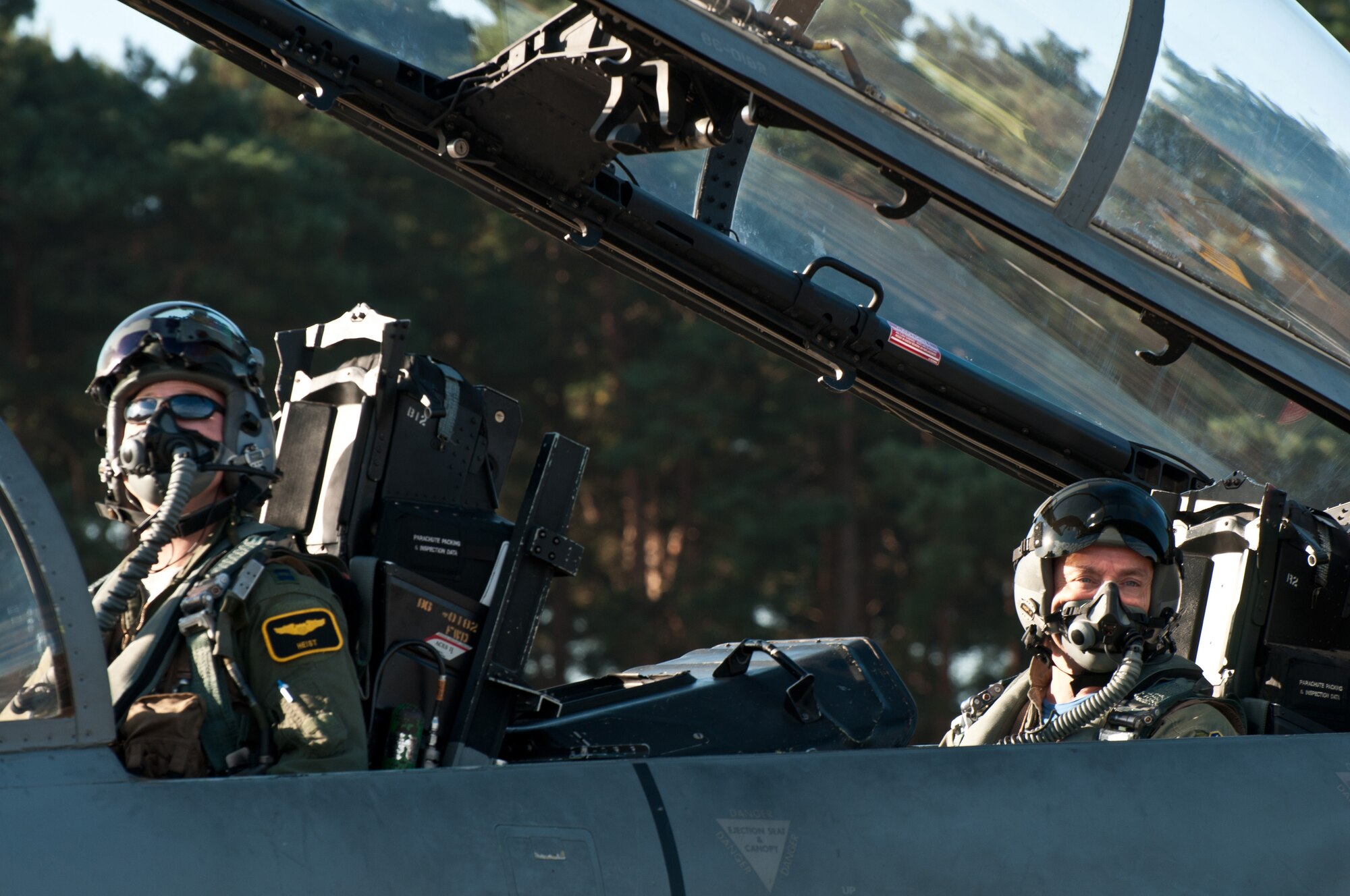 ROYAL AIR FORCE LAKENHEATH, England - Colin Wills (right), former 493rd Fighter Squadron honorary commander, prepares to takeoff in an F-15D Eagle Sept. 7, 2012. Wills received an incentive flight with the 493rd FS to better understand the capabilities of the F-15 and to thank him for his service as the squadron’s honorary commander. (U.S. Air Force photo by Senior Airman Connor Estes)