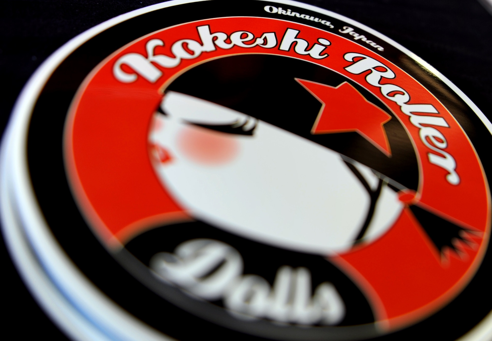 Stickers lie on a table to be sold during a Kokeshi Roller Derby bout at Kadena Air Base, Japan, Sept. 8, 2012. The bout was held inside Kadena's Marine Wing Liaison hangar to help raise money for the Air Force ball being held at the Rocker NCO Club Sept. 15. More than $1,000 was raised for the event. (U.S. Air Force photo/Staff Sgt. Sara Csurilla)