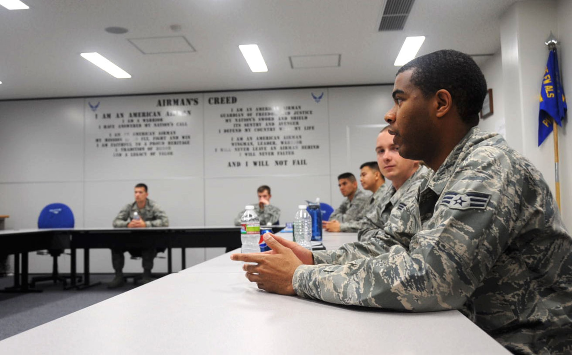 U.S. Air Force Senior Airman Devon Elliot, Airman Leadership School student, speaks during class at Misawa Air Base, Japan, Sept. 11, 2012. An Airman must have at least 48 months’ time in service before attending ALS, though less time is allowed if the Airman is a senior airman who has been selected for promotion to staff sergeant. (U.S. Air Force photo by Airman 1st. Class Kenna Jackson/Released)