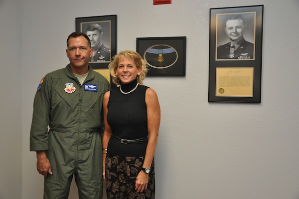 DAVIS-MONTHAN AFB, Ariz. - Dr. Christine Altendorf, USACE Headquarters Chief of Environmental Division, pauses for a photo with Air Force Col. Kevin E. Blanchard, the commander of the 355th Fighter Wing Aug. 30. Altendorf visited the base to tour military and Corps projects in the Southern Arizona area to see how the USACE Los Angeles District is implementing sustainaibility initiatives and how they could be taken to a Corps-wide level. 