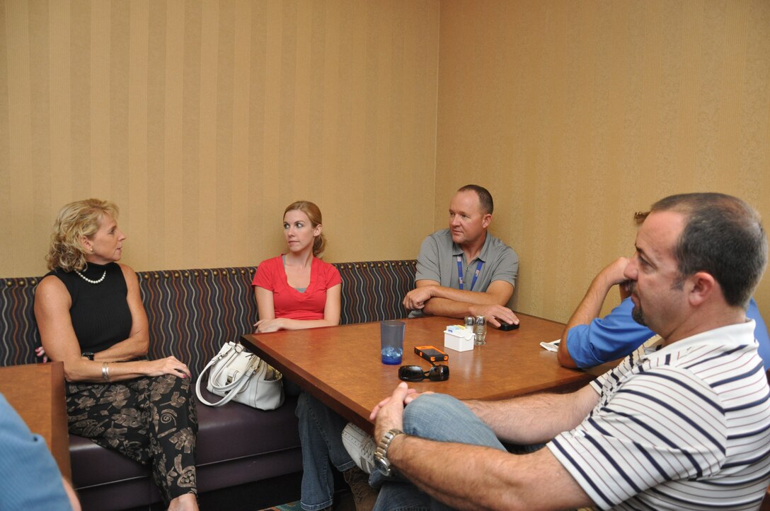 TUCSON, Ariz. - Dr. Christine Altendorf, USACE Headquarters Chief of Environmental Division, speaks with a group of USACE Los Angeles District Tucson Resident Office team members Aug. 30 during a lunch break. Altendorf visited USACE, military and other federal facilities throughout Southern Arizona during her two-day visit to see how the District is implementing sustainaibility initiatives. 