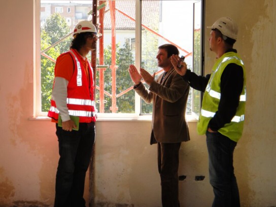Marcelo Maier (left), a U.S. Army Corps of Engineers Europe District civil engineer for special projects conducts a site inspection of a telemedicine facility in Kukes, Albania. After one year on the job and an informal mentorship Maier is helping to build the Humanitarian Assistance program.