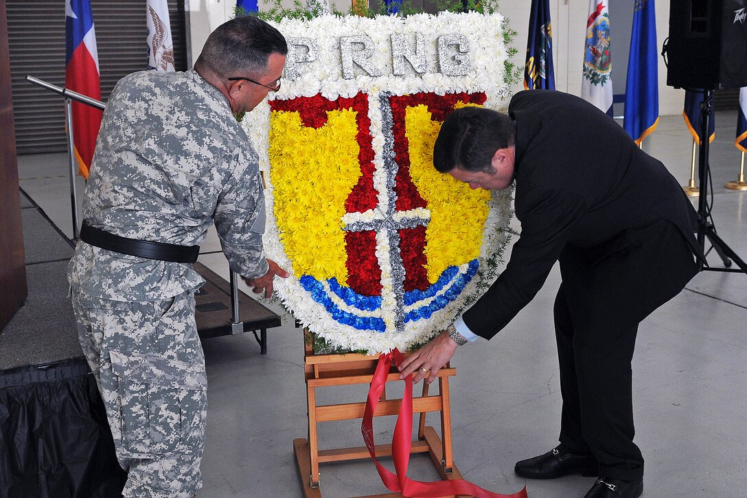 Members of the Puerto Rico National Guard commemorate the 11th anniversary of the 9/11 terrorist attacks in Carolina, Puerto Rico, Sept. 11, 2012.