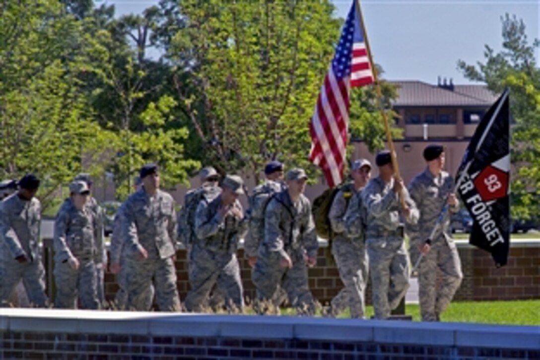 Airmen complete a 9/11 Memorial Ruck March on Joint Base Andrews, Md., Sept. 11, 2012, to commemorate the 9/11 terrorist attacks. More than 25 airmen, assigned to the 11th Security Forces Group, participated in the three-hour march around the installation's perimeter.