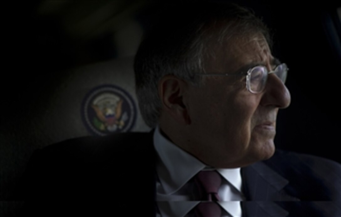 Secretary of Defense Leon E. Panetta gazes out the window of his helicopter as he flies to the Flight 93 National Memorial in Shanksville, Pa, on Sept. 10, 2012.  Panetta will lay a wreath honoring the passengers and crew of United Airlines Flight 93.  