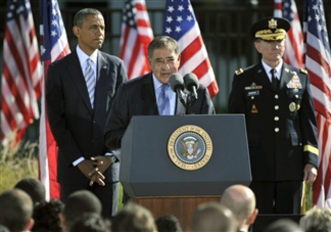 Secretary of Defense Leon E. Panetta delivers his remarks as President Barack Obama, left, and Chairman of the Joint Chiefs of Staff Gen. Martin E. Dempsey look out at the audience at a ceremony commemorating the 11th anniversary of the Sept. 11, 2001, terrorist attacks on the Pentagon on Sept. 11, 2012.  