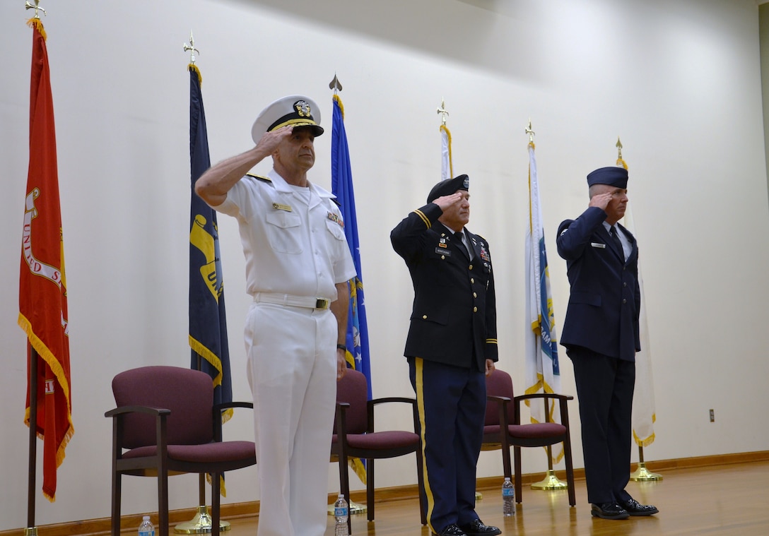 Navy Rear Adm. William M. Roberts (far left) became the second commandant of the Medical Education & Training Campus (METC) during an Assumption of Commandant ceremony September 7.  (Also pictured: Army Col. Gino Montagno, METC deputy commandant (center), and  Air Force Chief Master Sgt. Joel Berry, METC command chief (right). METC trains the world's finest medics, corpsmen, and
techs; supporting our nation's ability to engage globally. (Photo by Lisa Braun/released)
