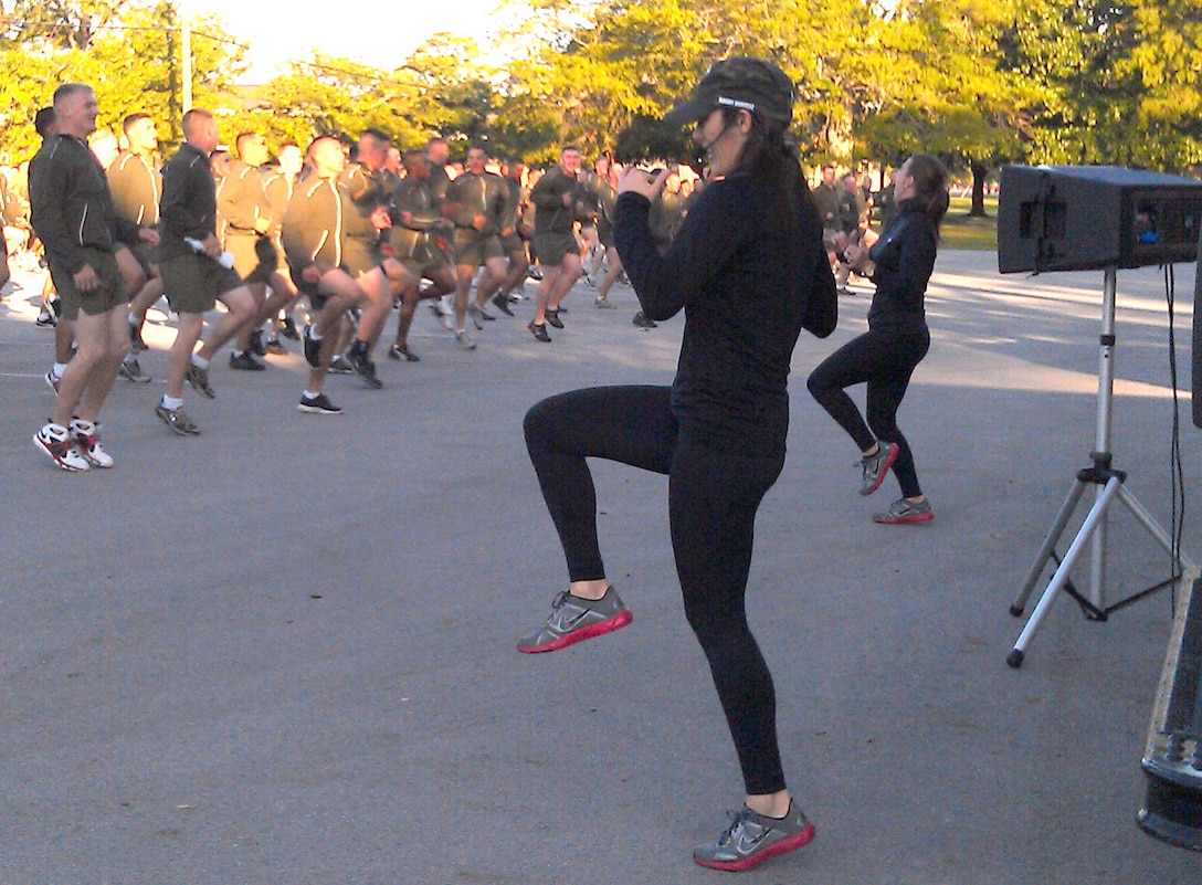 Semper Fit leads Marines and federal employees through their warm-ups before 2011's Combined Federal Campaign 5K Fun Run/Walk Nov. 5. This year the run is scheduled for Oct. 3 at Goettge Memorial Field House aboard Marine Corps Base Camp Lejeune.  