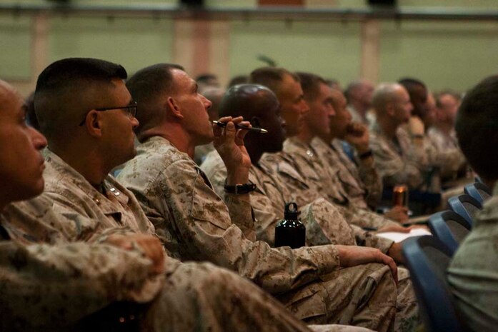 U.S. Marines with 1st Marine Division and 1st Marine Logistics Group receive a sexual assault prevention and response brief aboard Marine Corps Air Ground Combat Center, Twentynine Palms, Calif., Aug. 28, 2012. (U.S. Marine Corps photo by Cpl. Kowshon Ye/ Not Reviewed)