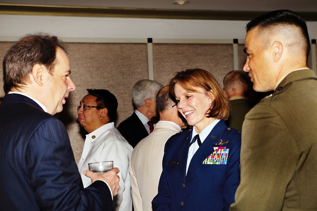 Dr. Ingo Neu (left), chief of party for PREPARE (Pandemic Preparedness); U.S. Air Force Brig. Gen. Pamela Milligan, U.S. Pacific Command operations' (J3) chief of staff; and U.S. Marine Col. Andrew Wilcox, U.S. Marine Corps Forces, Pacific, plans (G5) director, converse during the Philippine Multi-sectoral Pandemic Disaster Exercise held in Makati, Philippines, Sept. 10. As with other bilateral exchanges, this event reinforces the mutual commitment shared between the Philippines and the U.S. to enhance the effective response capabilities to regional threats.