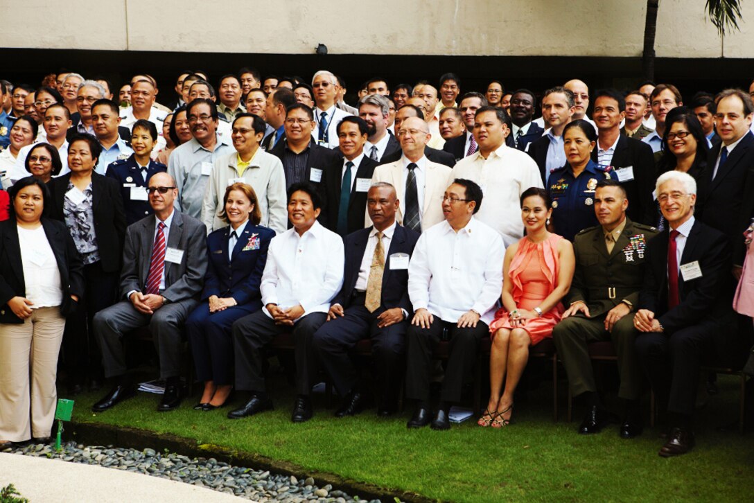 More than 175 Philippine and U.S. civil and military participants display their support and cooperation during the Philippine Multi-sectoral Pandemic Disaster Exercise held in Makati, Philippines, Sept. 10. As with other bilateral exchanges, this event reinforces the mutual commitment shared between the Philippines and the U.S. to enhance the effective response capabilities to regional threats.