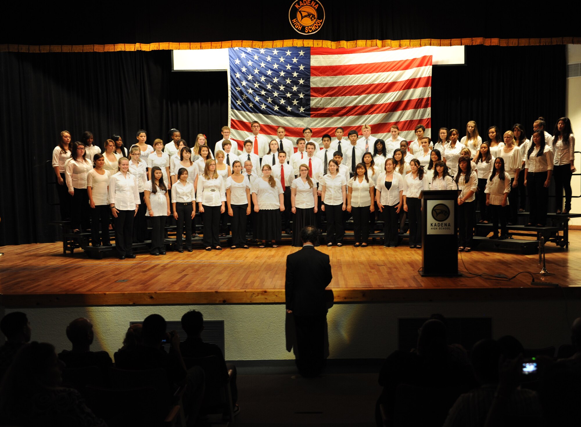 More than 60 members of the Kadena High School combined choir perform during a Patriot Day celebration at school on Kadena Air Base, Japan, Sept. 12, 2012. The students and staff paid tribute to the victims of 9/11 and service members who gave their lives. (U.S. Air Force photo/Airman 1st Class Malia Jenkins)   