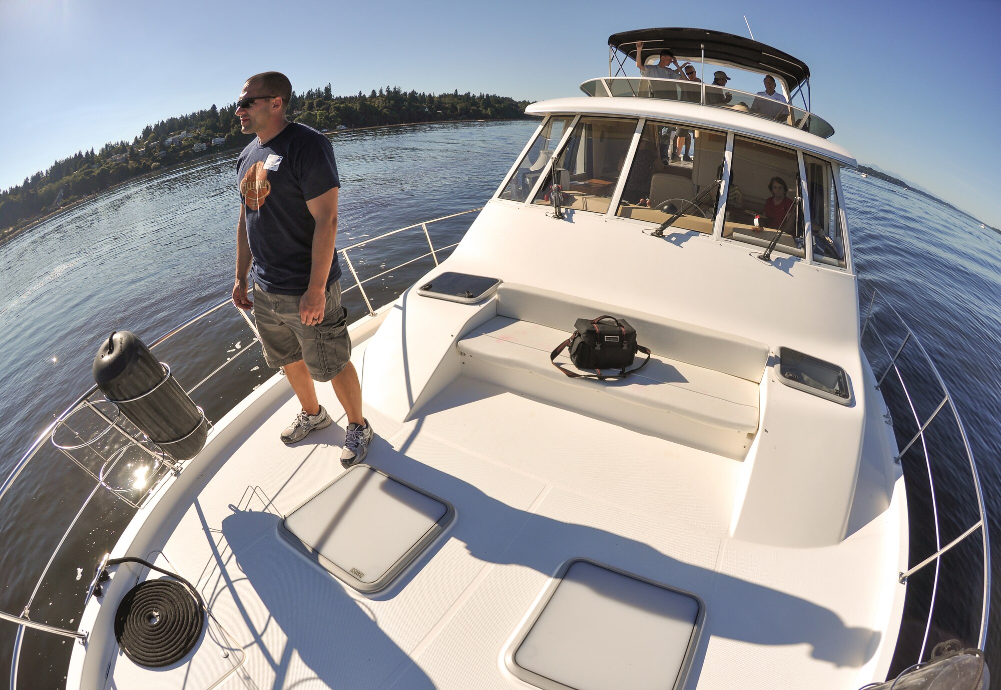 Air Force Staff Sgt. Eric Dasher, 62nd Maintenance Squadron precision measurement equipment laboratory technician, enjoys a ride on a yacht participating in the 50th annual Foofaraw event, Sept. 6, 2012. Hosted by the Olympia Yacht Club and the Thurston County Chamber of Commerce, the event is a local tradition to honor military servicemembers. (U.S. Air Force photo/Staff Sgt. Sean Tobin)