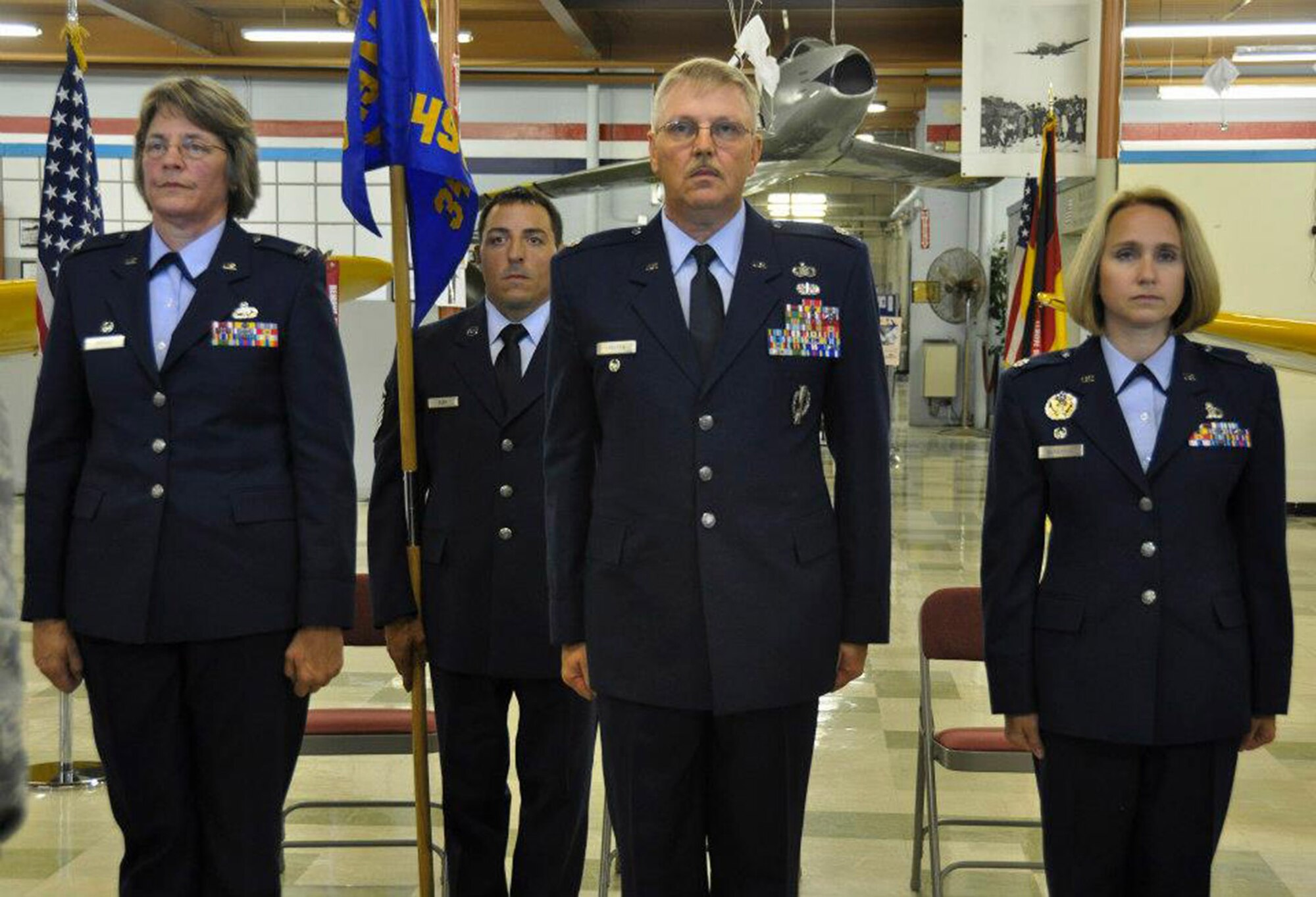 TRAVIS AIR FORCE BASE, Calif. -- Lt. Col. Sarah Mangahas assumes command of the 349th Force Support Squadron from Lt. Col. Neal Landeen during a change of command ceremony held at Travis Air Force Base on Sept. 8, 2012. (U.S. Air Force photo/ Senior Airman Amelia Leonard) Air Force Reserve Command