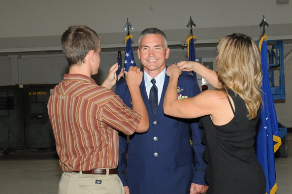 Newly promoted Maintenance Group Commander Col. David Trimble with son Dylan and wife Julie at Gowen Field, Boise, Sept. 7.
