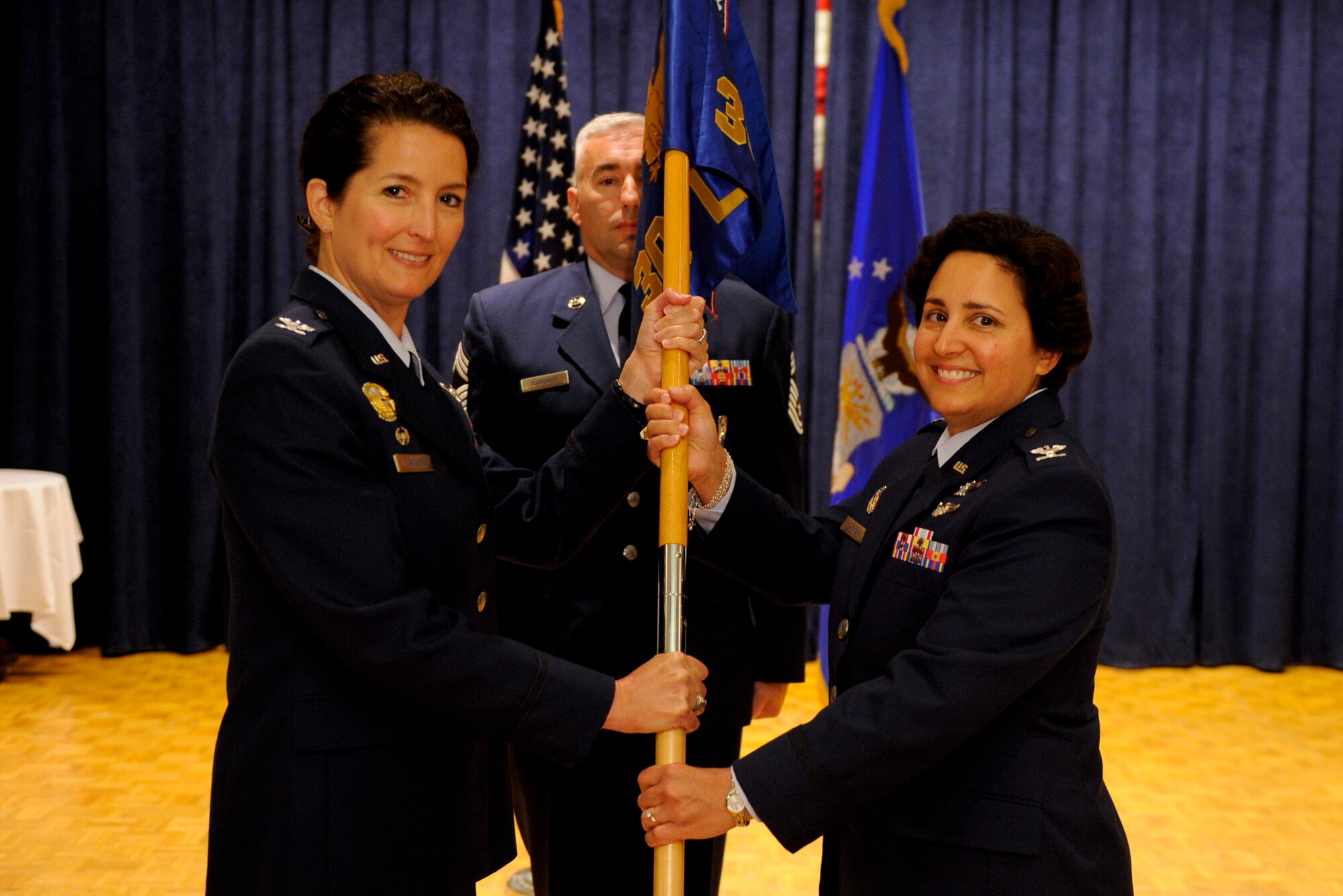 VANDENBERG AIR FORCE BASE, Calif. -- Col. Shahnaz Punjani, 30th Launch Group incoming commander, relinquished command of the 30th LCG to Col. Nina Armagno, 30th Space Wing commander, during the 30th LCG change of command at the Pacific Coast Club here Monday, September 10, 2012.  Col. Shahnaz Punjani took command of the group after Col. Lavanson Coffey III relinquished command. (U.S. Air Force photo/Staff Sgt. Levi Riendeau)
