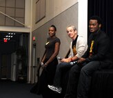 Three members from “The Lion King” musical tour, Electra Watson, Mark David Kaplin and John Sloan III, respond to a question from an audience member at a meet-and-greet at the Robert J. Dole Community Center Ballroom, Sept. 11, 2012, McConnell Air Force Base, Kan. The group came to McConnell to meet the base community and promote the month of performances they will be doing in September. (U.S. Air Force photo/Airman 1st Class Victor J. Caputo)