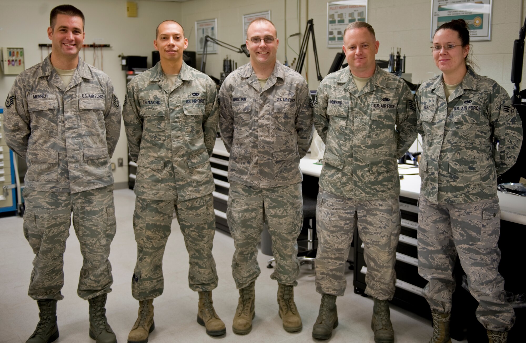 Members from the Air Force Repair Enhancement Program pose for a group photo Sept. 10, 2012, at Dyess Air Force Base, Texas. In the last year alone, this five-man shop generated more than $3.2 million for Dyess. (U.S. Air Force photo by Airman 1st Class Charles V. Rivezzo/ Released)