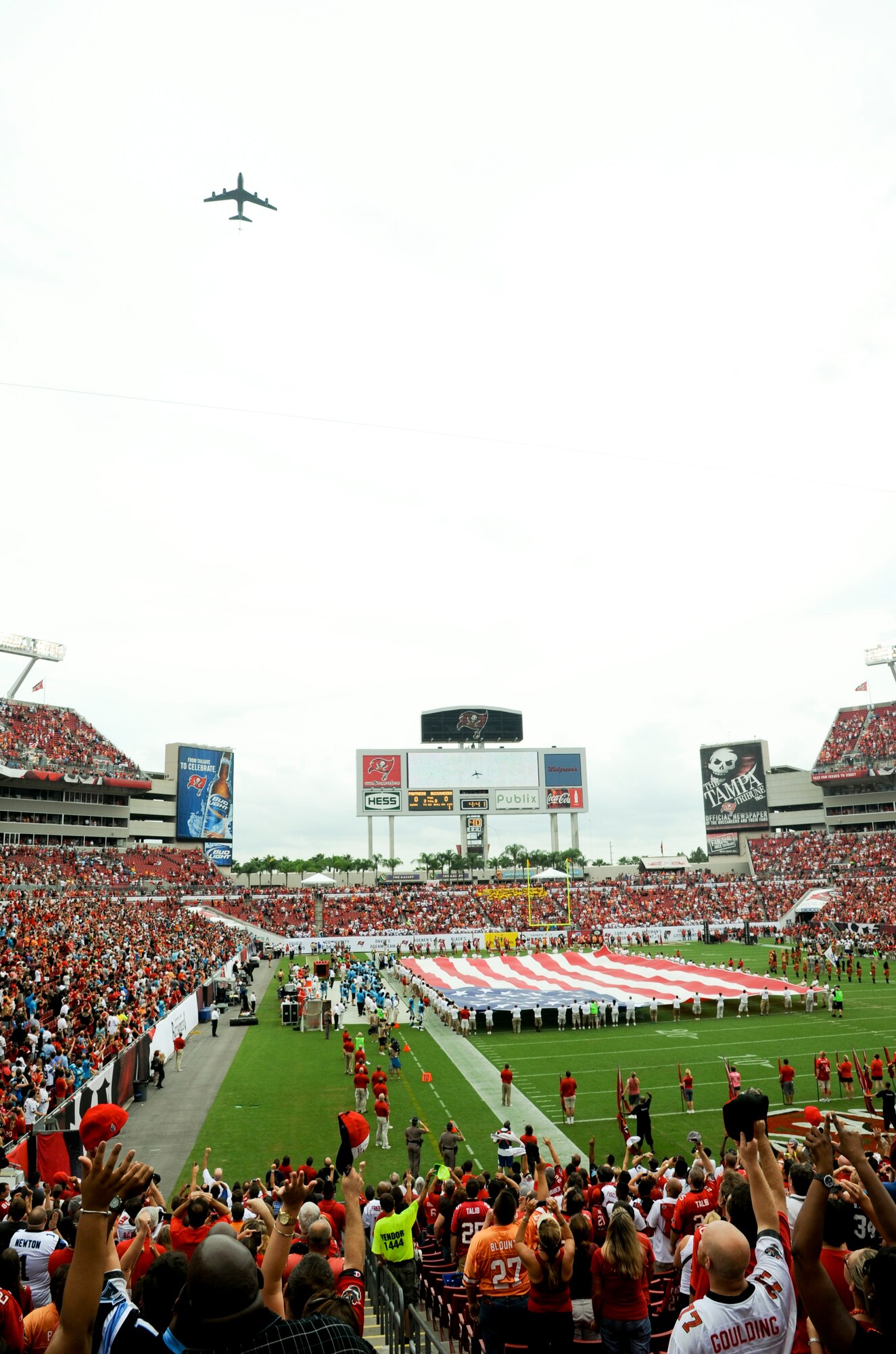 TAMPA, Fla. – A KC-135 Stratotanker descends upon the crowd at the Tampa Buccaneers Stadium September 7, 2012 at the beginning of a football game.  The aircraft flew from MacDill Air Force Base over the stadium during the crescendo of the National Anthem.  (Official U.S. Air Force photo/Staff Sgt. Jennie Chamberlin)