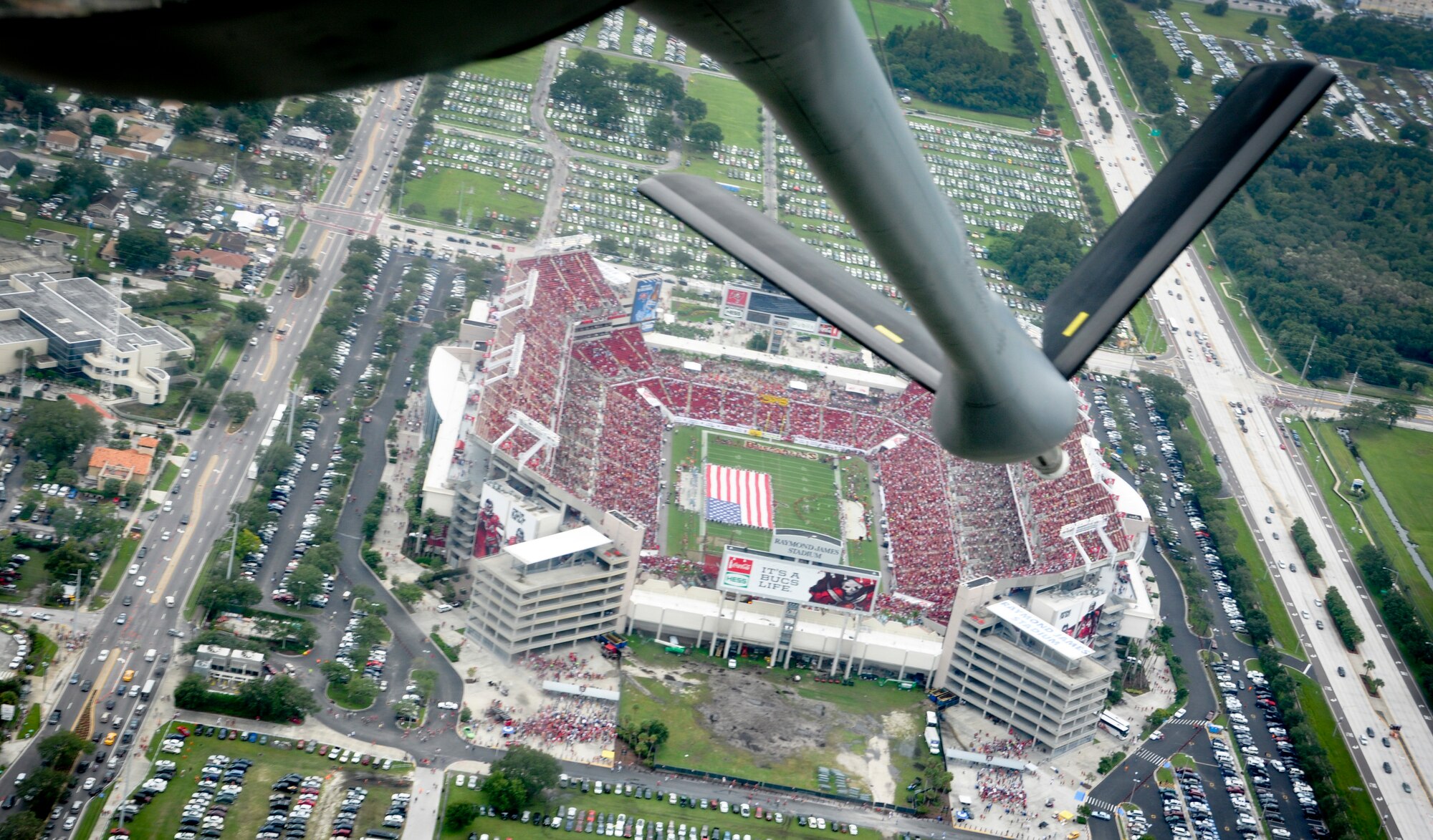 TAMPA, Fla. – MacDill Air Force Base sent one of its KC-135 Stratotankers to fly over the Tampa Buccaneers Stadium September 7, 2012.  Looking down from the boom pod in the back of the aircraft, a boom operator has a bird's eye view of the stadium.  (Official U.S. Air Force photo/Maj. Shane Huff)