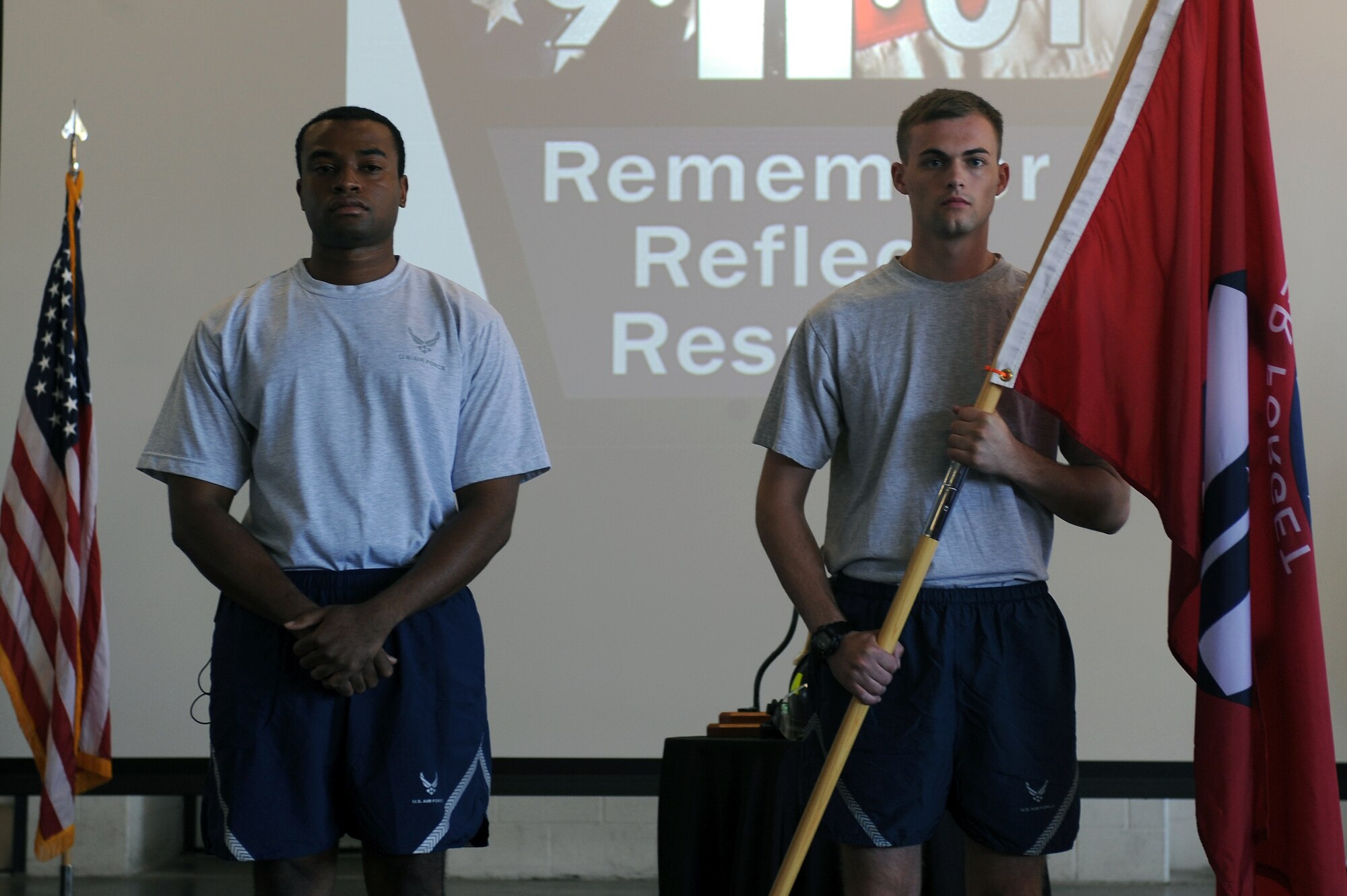 U.S. Air Force Staff Sgt. Decota Thomas (left), 4th Security Forces Squadron fitness monitor, and Airman 1st Class Benton Vandergrift, 4th Civil Engineer Squadron firefighter, await the signal to begin a 24-hour run on Seymour Johnson Air Force Base, N.C., Sept. 11, 2012. Seymour Johnson personnel are conducted a 24-hour run in honor of those killed in the 9/11 attacks. (U.S. Air Force photo/Airman 1st Class John Nieves Camacho/Released)