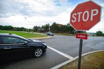 HANSCOM AIR FORCE BASE, Mass. – Vehicles pull up to the new four-way stop at the corner of Grenier and Randolph streets Sept. 5. Based on increased traffic due to office moves and the future occupation of the Massachusetts National Guard Joint Force Headquarters Building, the Traffic Safety Coordinating Group determined a four-way stop intersection was warranted to improve traffic safety and traffic flow. (U.S. Air Force photo by Rick Berry)
