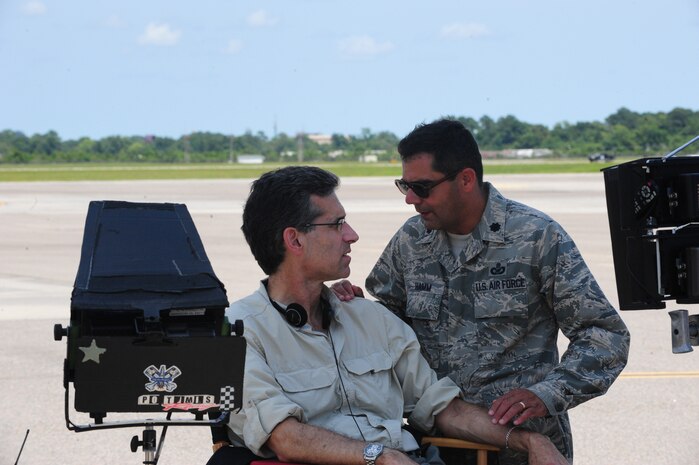 Director John Kretchmer discusses a scene with Lt. Col.Francisco Hamm, Air Force Entertainment Liaison Office director, while on the set of Army Wives at Nose Dock 1, June 20, 2012, at Joint Base Charleston - Air Base, S.C.  The U.S. Air Force supports many entertainment projects annually – check out www.airforcehollywood.af.mil for more info. (U.S. Air Force photo/Airman 1st Class Tom Brading)