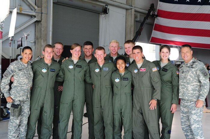 Actor Brian McNamara, who plays Major General Michael Holden, actress Wendy Davis who plays LTC Joan Burton on the Lifetime drama series Army Wives pose for a photo with cadets from the Air Force Academy, at Nose Dock 1, June 20, 2012, at Joint Base Charleston - Air Base, S.C. Army Wives tells the story of four women and one man who are brought together by their common bond – they all have military spouses. The series is based on the book "Under the Sabers: The Unwritten Code of Army Wives" by Tanya Biank. Army Wives is produced by ABC Television Studio and The Mark Gordon Company.  (U.S. Air Force photo/ Airman 1st Class Chacarra Walker)