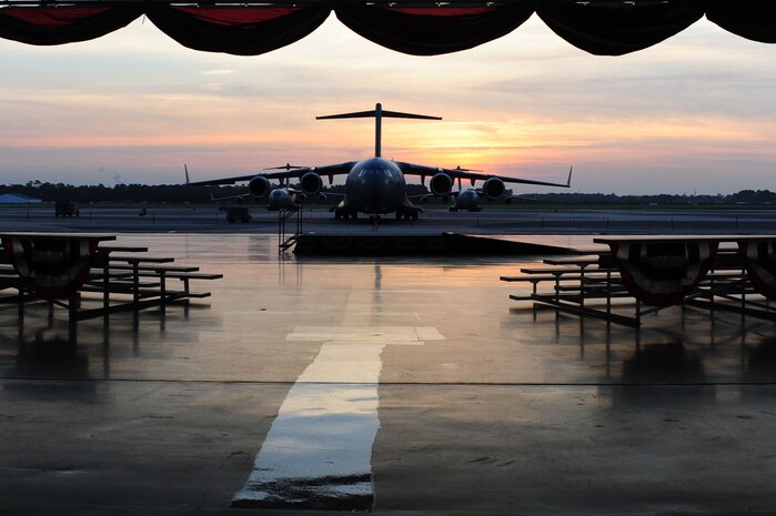 The sun rises over at C-17 during the filming of the Lifetime drama series Army Wives, at Nose Dock 1, June 20, 2012, at Joint Base Charleston - Air Base, S.C. Army Wives tells the story of four women and one man who are brought together by their common bond – they all have military spouses. The series is based on the book "Under the Sabers: The Unwritten Code of Army Wives" by Tanya Biank. Army Wives is produced by ABC Television Studio and The Mark Gordon Company.  (U.S. Air Force photo/ Airman 1st Class Chacarra Walker)