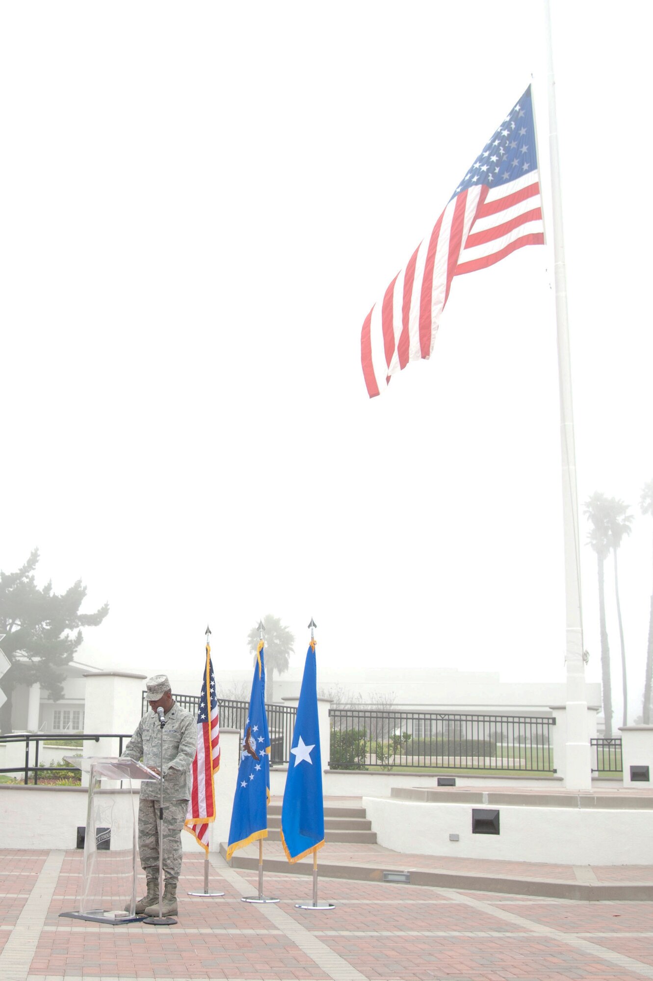 VANDENBERG AIR FORCE BASE, Calif. – Chaplain Lt. Col. Warren Watties, 30th Space Wing chaplain, introduces the guest speaker during a 9/11 Memorial Service in front of the headquarters building here Tuesday, September 11, 2012. The ceremony was a way to commemorate the 13,674 people who died on and as a result of September 11, 2001. (U.S. Air Force photo/ Senior Airman Lael Huss)